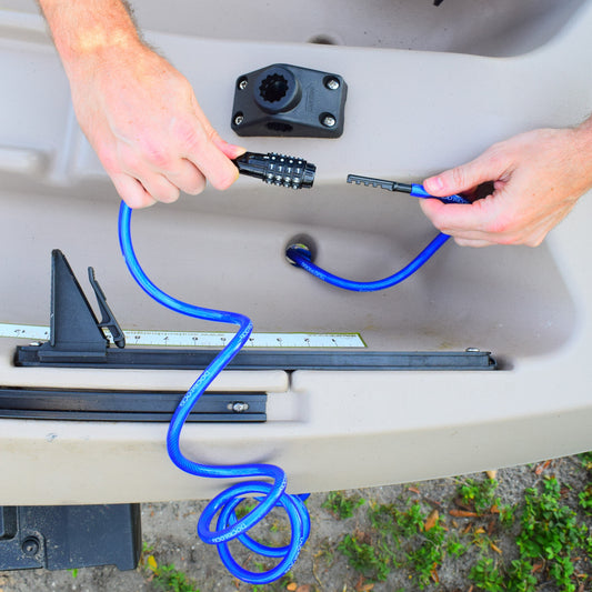 DocksLocks cable lock threaded through a kayak scupper hole