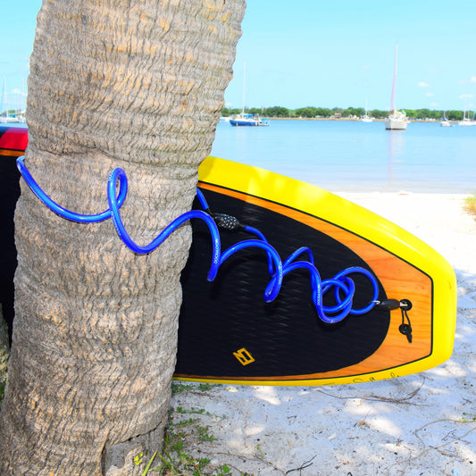 DocksLocks Jaws lock securing a paddleboard to a roof rack